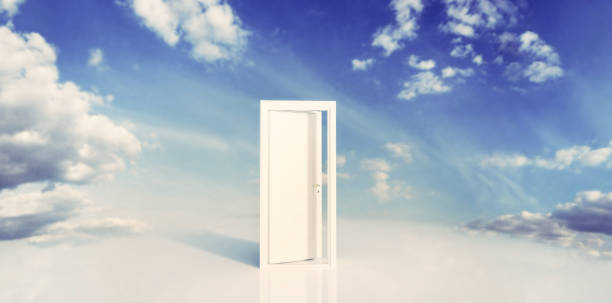 istock Open door to blue sky. Hope, new life, change concept. 1334867000