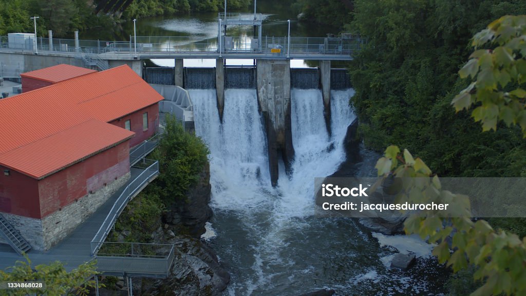 hydroelectricity turbine energy generator power plant waterfalls hydroelectric dam in Sherbrooke Quebec Canada hydroelectric dam power plant electricity turbine generator in Sherbrooke Quebec Sherbrooke - Quebec Stock Photo