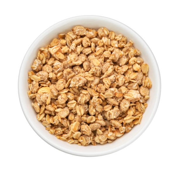 istock Granola, crunchy muesli isolated on white background, top view 1334868128