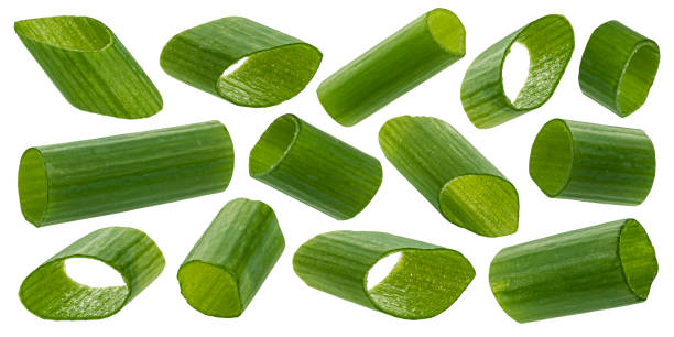 istock Green onion, chopped chives isolated on white background 1334868144