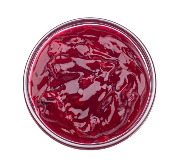 istock Berry jam isolated on white background, top view 1334868426