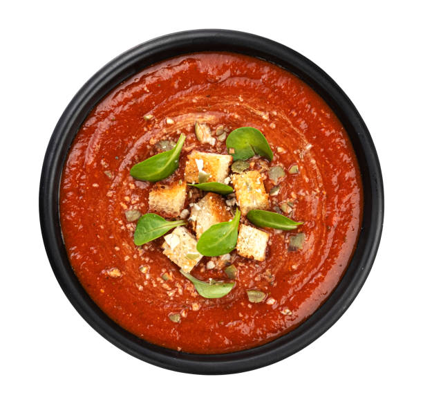 tazón de sopa de tomate aislado sobre fondo blanco, vista superior - sopa de tomate fotografías e imágenes de stock