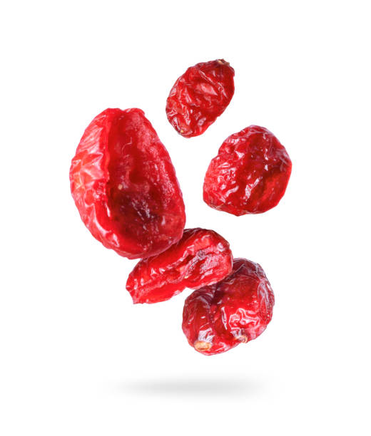 istock Dried cranberries close up in the air on a white background 1334871479