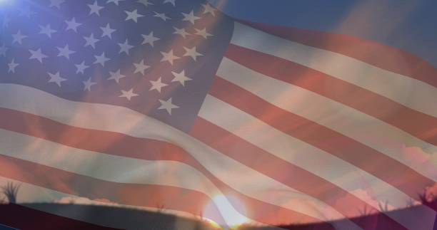 istock Composition of sky with clouds and sun over american flag 1334879208
