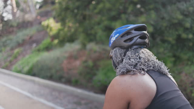 Senior Black Woman Riding Bicycle