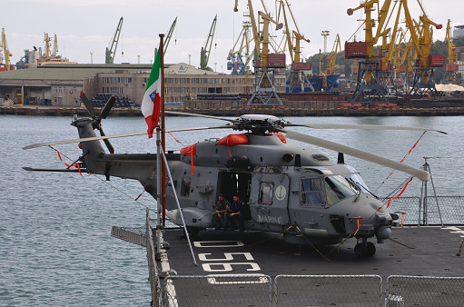 The shipboard helicopter crew of Italian Navy missile destroyer Luigi Durand de la Penne (D560) is resting in their free time. Port of Odessa. September 04, 2017