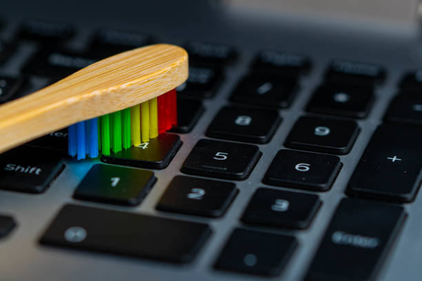 istock Use Toothbrush to clean Keyboard. 1334880494