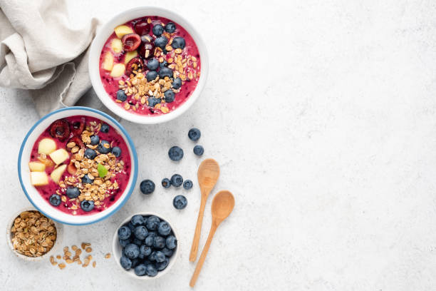 istock Vegan Purple Blueberry Smoothie Bowl With Toppings 1334881253