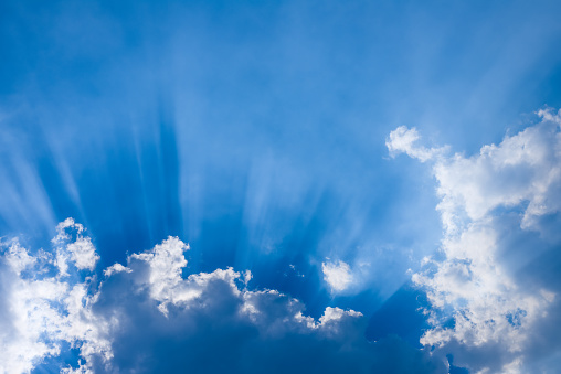 Sun rays on cloudy sky dramatic scene