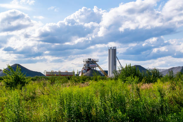 istock construction site, aggregate dumps, preparation of aggregate in a crusher and a silo 1334885177