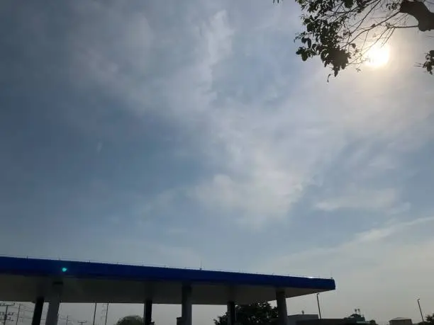 Gas station roof and morning sky