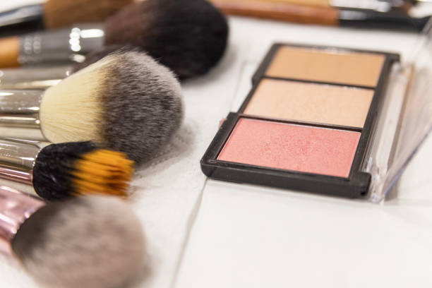 istock Make up the most necessary things. A set of brushes and professional cosmetics on the makeup artist's desk. Everything for applying makeup. Suitable for your beauty blog. Flatly. Copy space. 1334888654