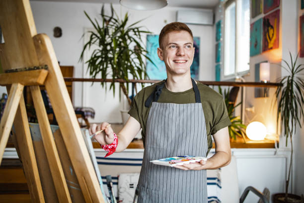 istock Young artist working on his new paint 1334890451