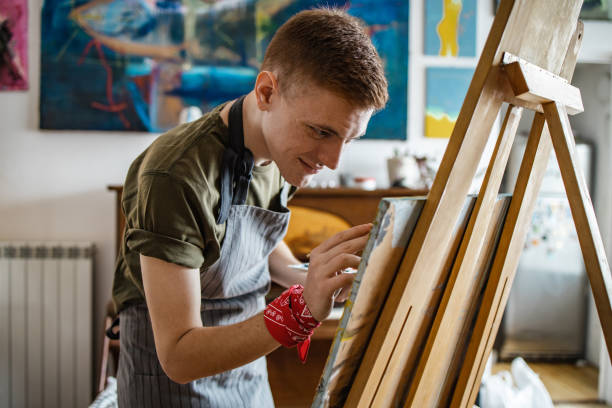 istock Young artist working on his new paint 1334890559