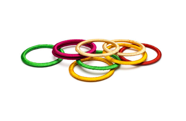 istock Scattered colorful bangles on an isolated white background 1334891547
