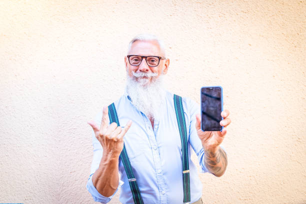 istock Senior man with a phone 1334893467