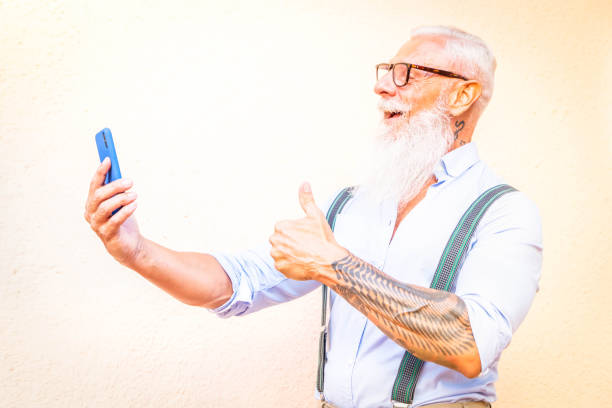 istock Senior man with a phone 1334893476