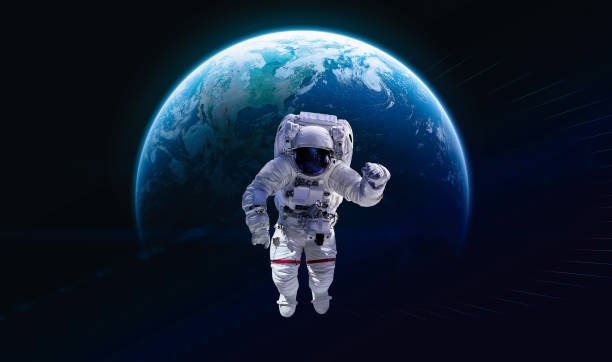 istock Astronaut in outer deep space on orbit of Earth planet. Dark space and spaceman. Elements of this image furnished by NASA 1334900059