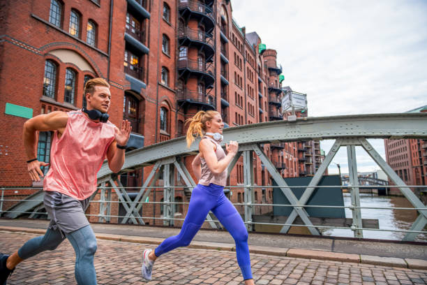 istock Fit  young couple going for a run outdoors 1334900120