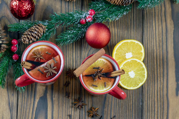 istock Glasses with mulled wine on a natural wooden background 1334900799