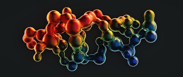 Shiny artificial molecular structure in many colors. Horizontal composition, isolated on black background.