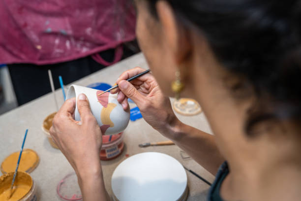 istock Pottery. Painting pottery. 1334904245
