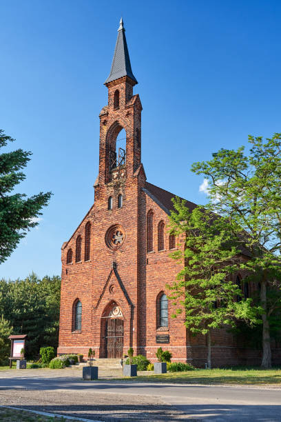 istock Rural, post-Evangelical church with a red brick bell tower 1334907246