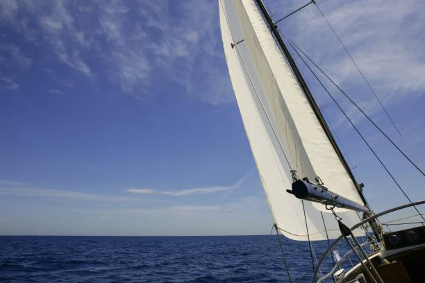 istock Sailboat sailing blue sea on sunny summer day 1334907357