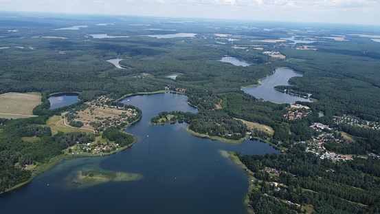 Aerial view of lake Zootzensee in the Rheinsberg Region, Brandenburg, Germany in August high season summertime.