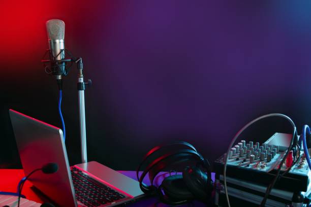 istock Microphone in the night colorful light 1334908120
