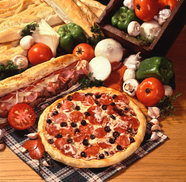 Pizza and sub sandwiches stock photo