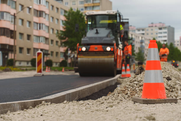 istock Road reconstruction. Heavy vibration road roller stacking hot asphalt. 1334914430