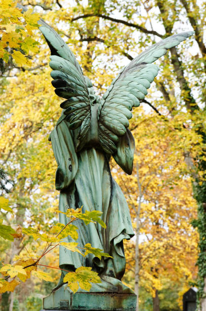 istock angel figure in an autumnal forest 1334926299