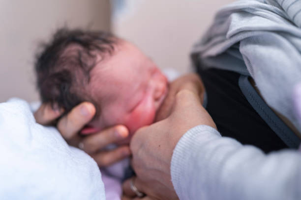 istock Newborn Baby Nursing In Hospital 1334932015