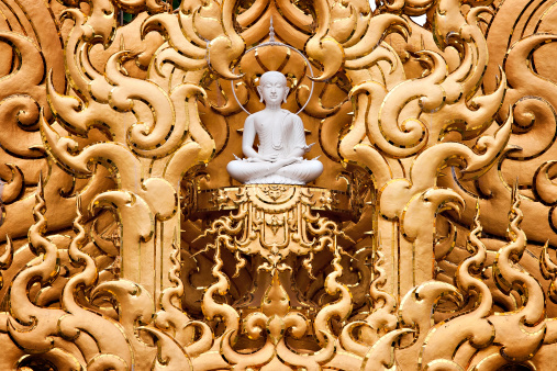 White monk statue at white temple (Wat Rong Khun, Chaingrai, Thailand).