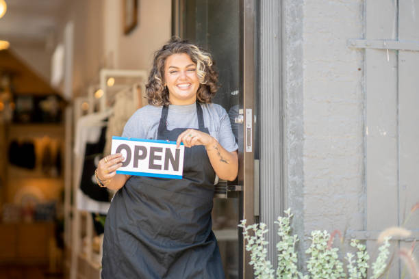 istock Small business owner reopening her store after lockdown 1334934634