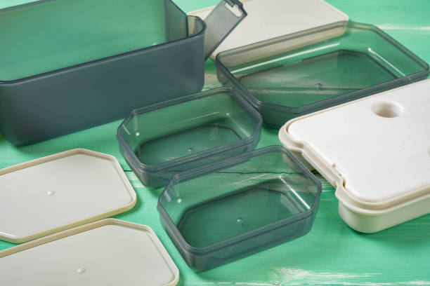 istock angle view plastic takeout lunch box with individual containers with the lids opened 1334941045