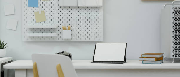 istock Minimal modern working space apartment, tablet screen mockup standing on desk 1334942725