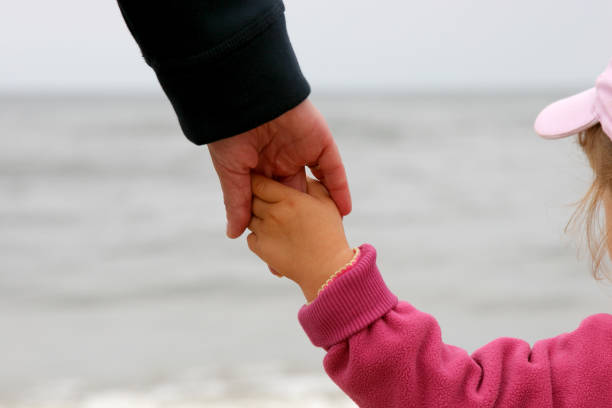 istock Mother's and daughter,s hands 133494327
