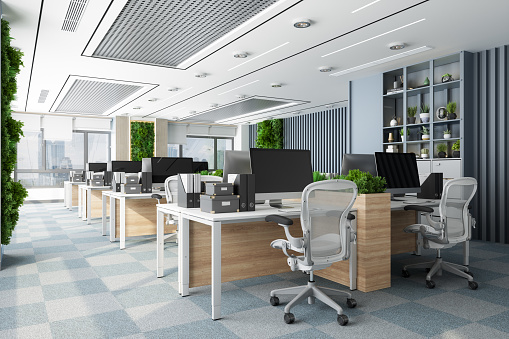 Eco-Friendly Open Plan Modern Office Interior With Tables, Office Chairs And Vertical Garden.