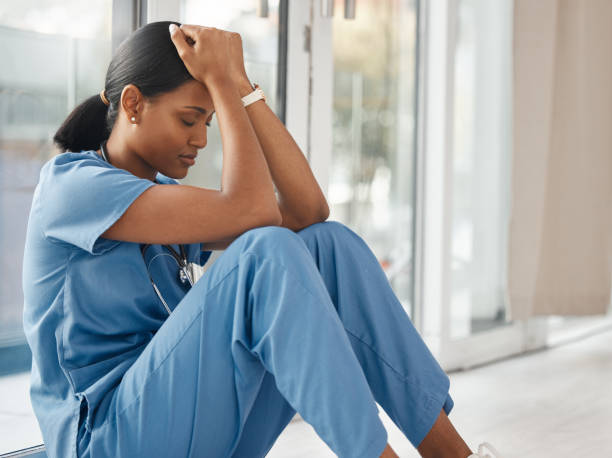 istock Shot of a young doctor looking distressed 1334957349