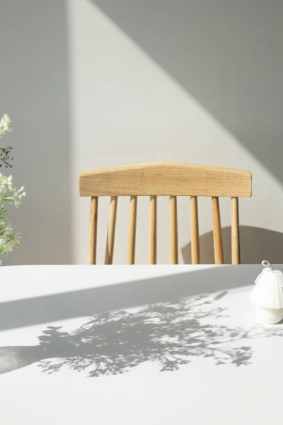 istock wooden chairs and table in bright modern interior. 1334963055