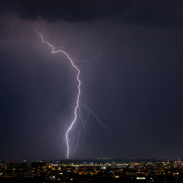 istock Spectacular lightning hit city suburbs 1334965958