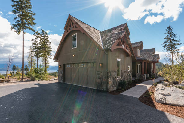 istock Large home on sloped hill in Montana 1334966036