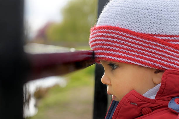 Toodler is looking at pond