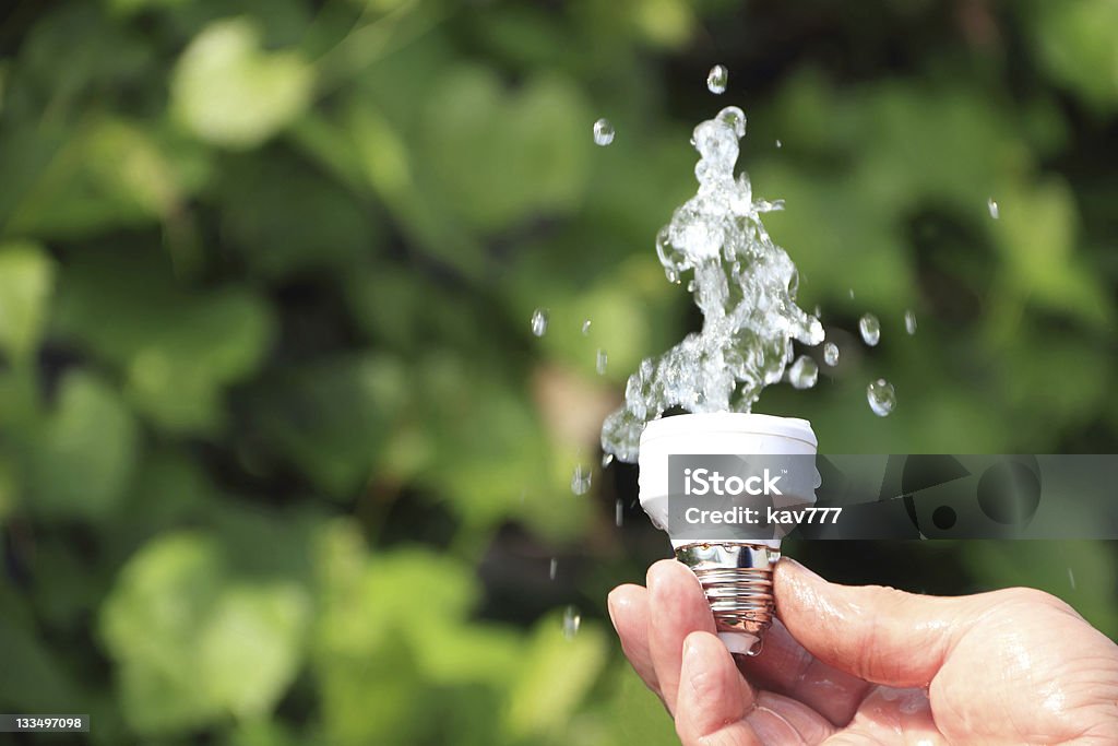 eco energy concept ecological concept symbolizing renewable energy, hydropower Electric Lamp Stock Photo