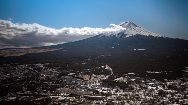 istock Beautiful Fuji mountain with snow cover on the top with cloud, 1334972221