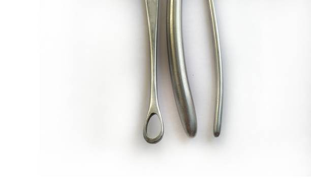 istock Surgical Instruments used in gynaecology Isolated on the White Background 1334972296
