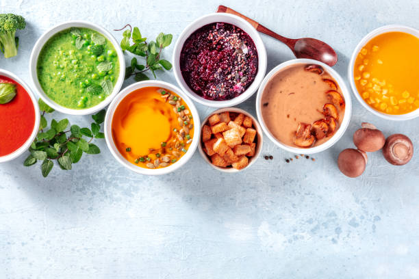 istock Vegan soups, fresh summer detox diet, overhead flat lay shot with copy space 1334973202
