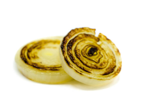 Grilled onion rings isolated on white background
